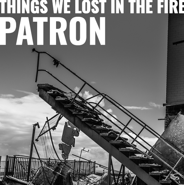 Black and white fine art photograph burnt staircase with words patron and things we lost in the fire written across image