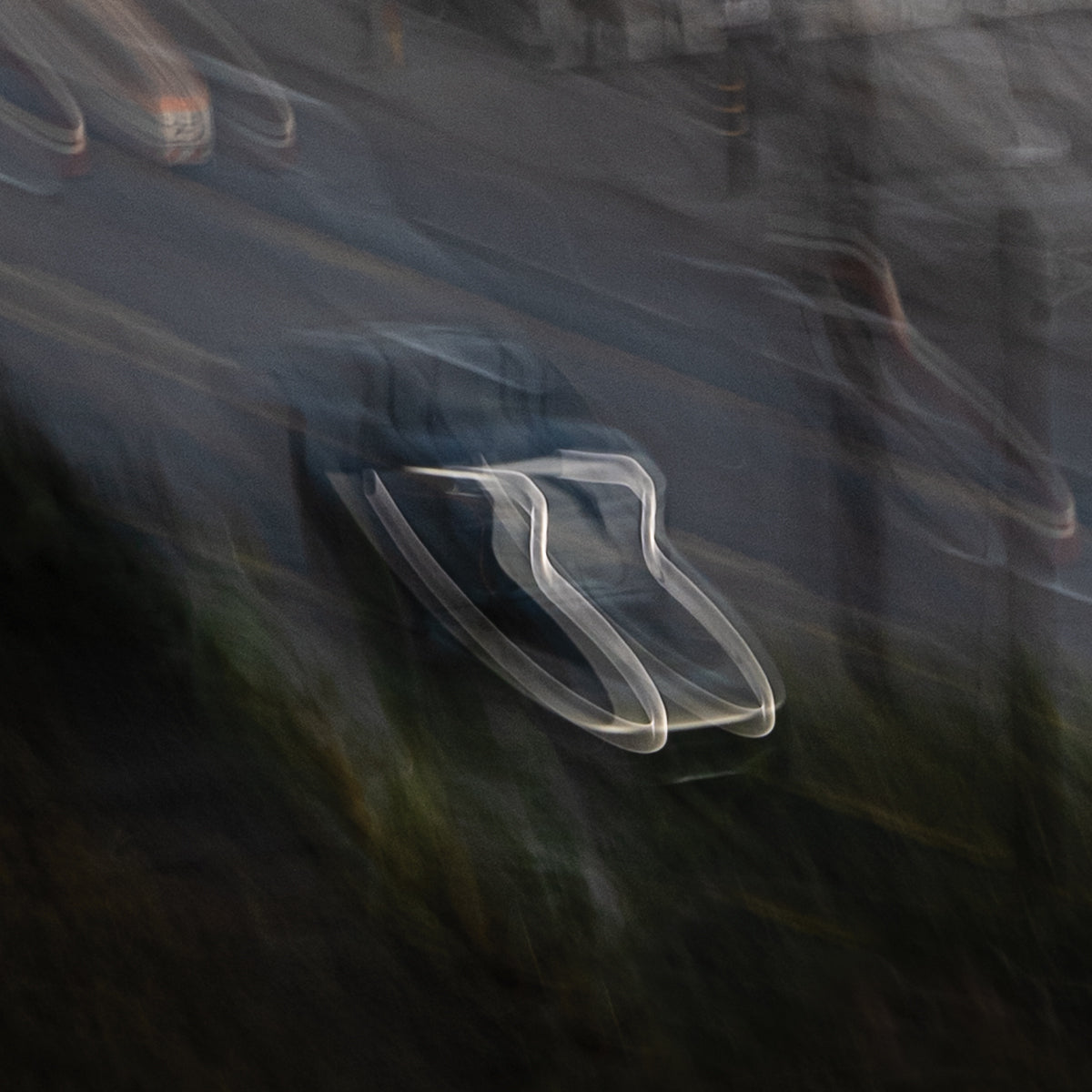 Clear plastic object on a textured dark surface