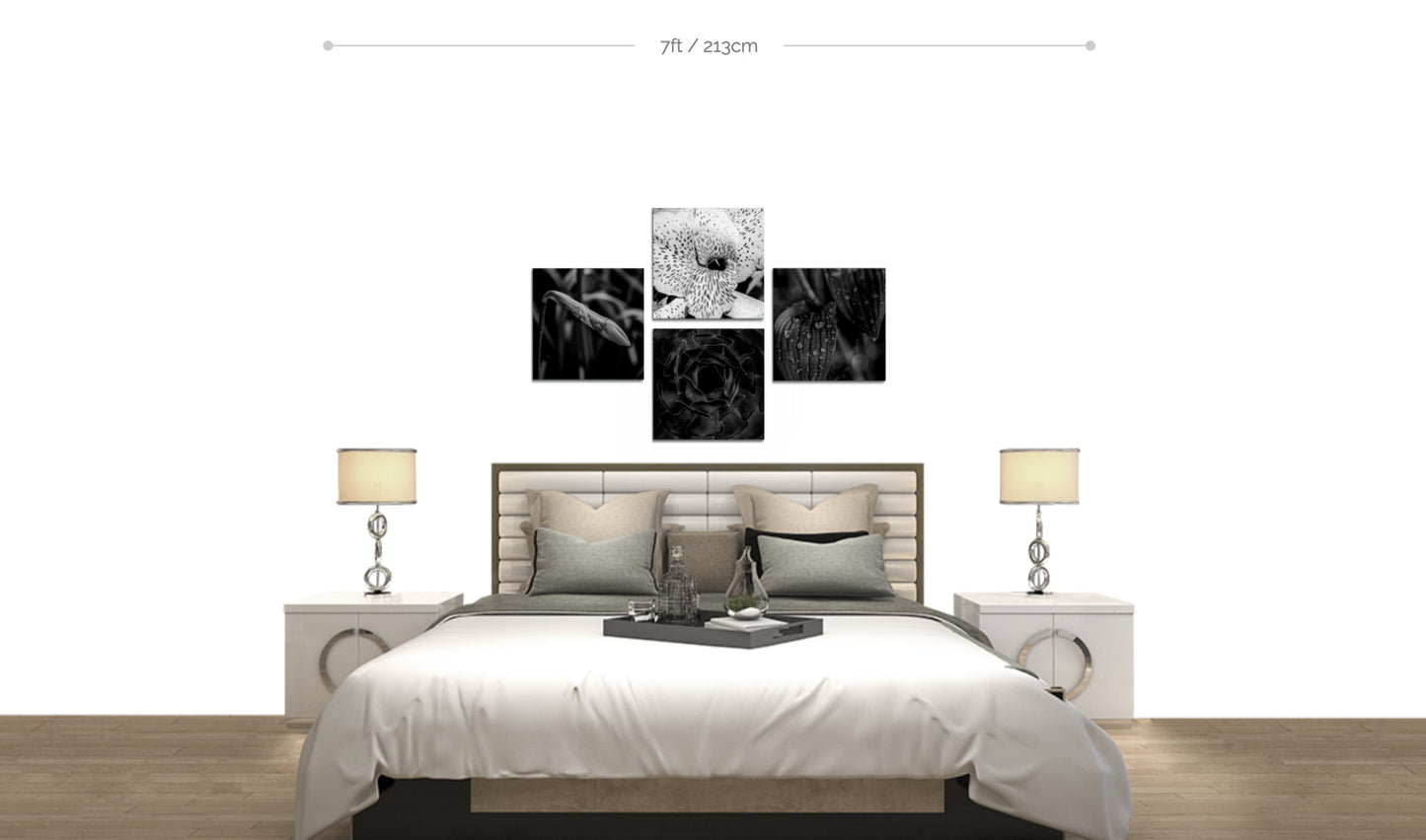 Set of 4 metal flower wall prints arranged in cross shape above bed