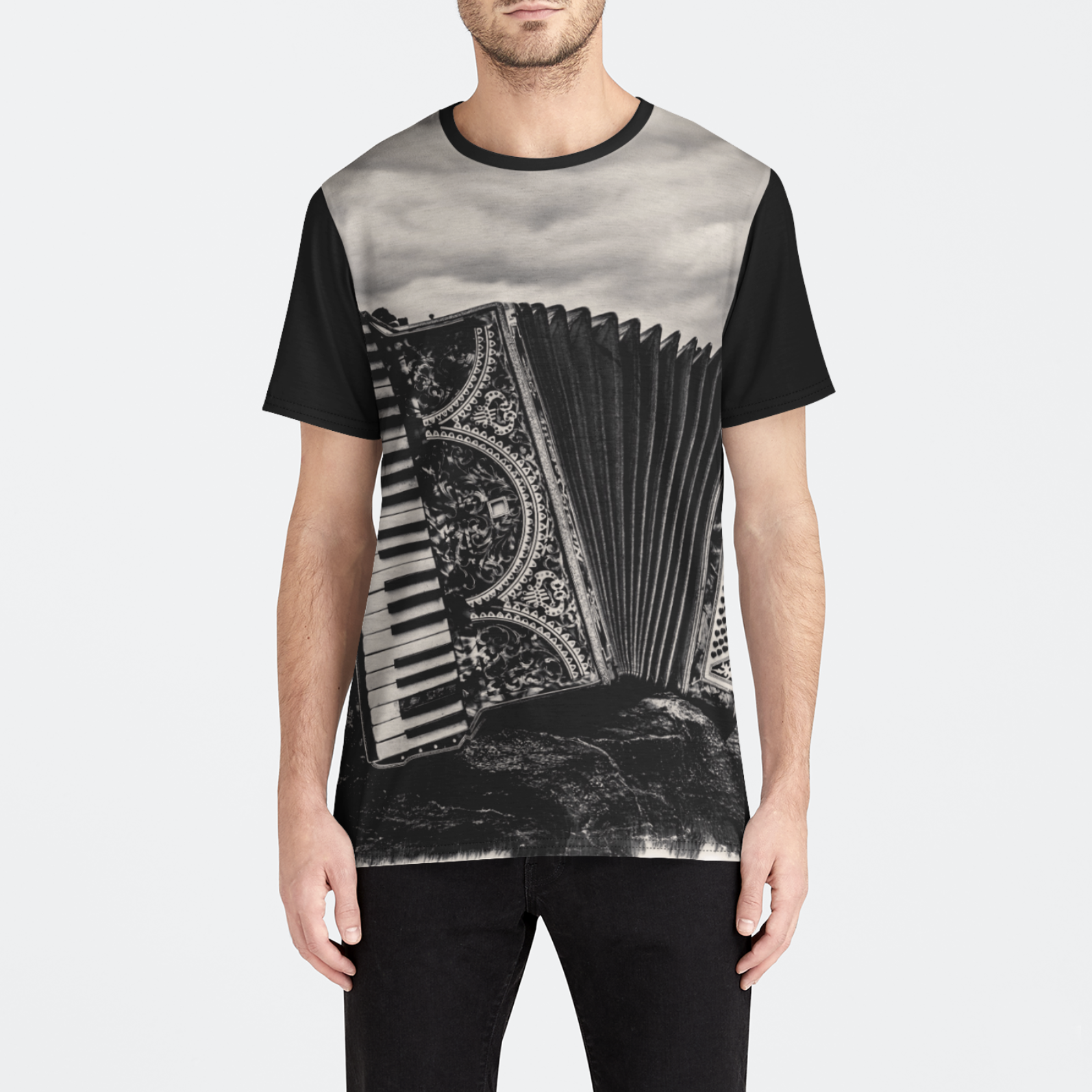 Person wearing a t-shirt with an accordion and piano design on a white background