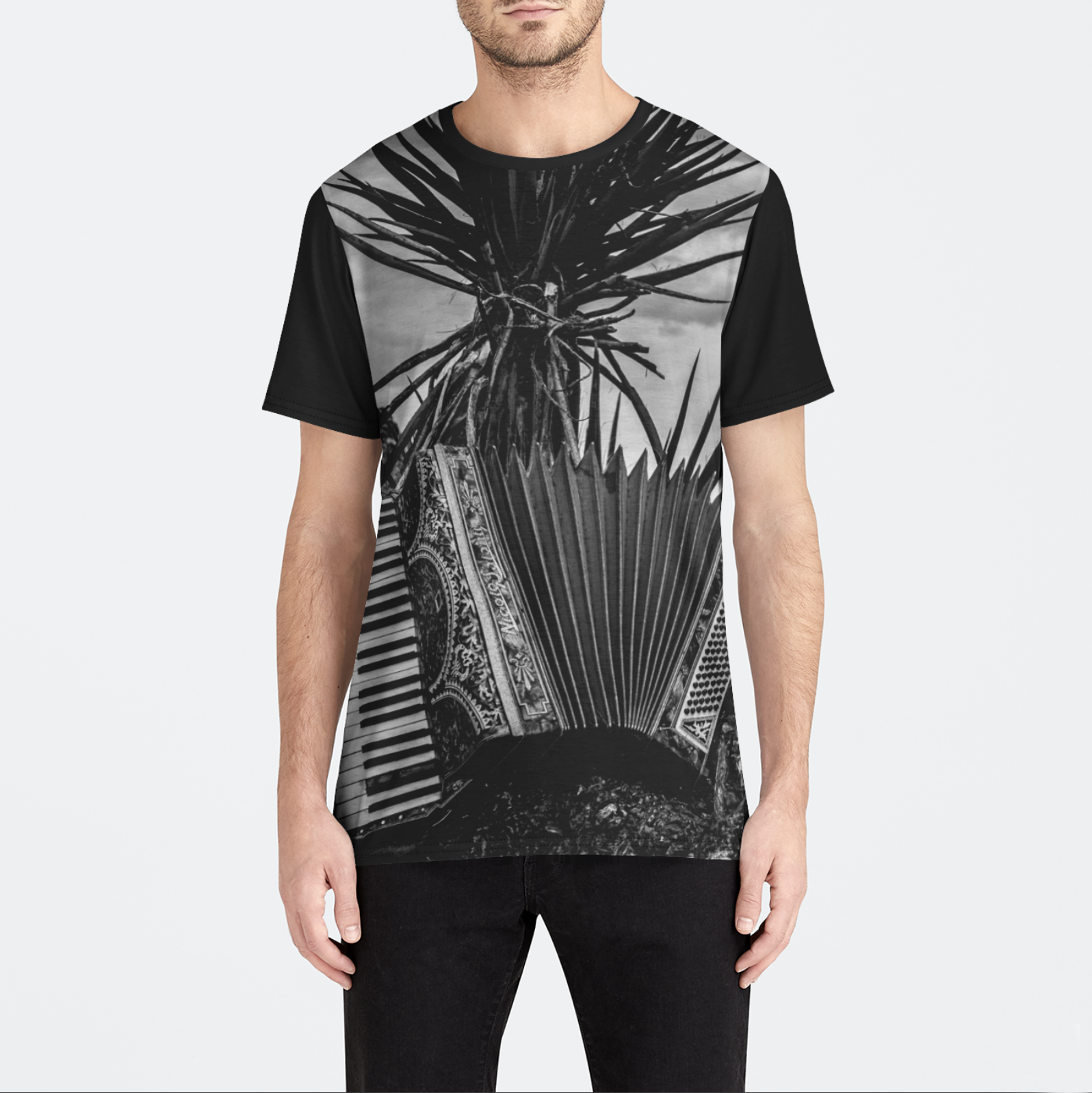 Person wearing a black t-shirt with a graphic design on a white background