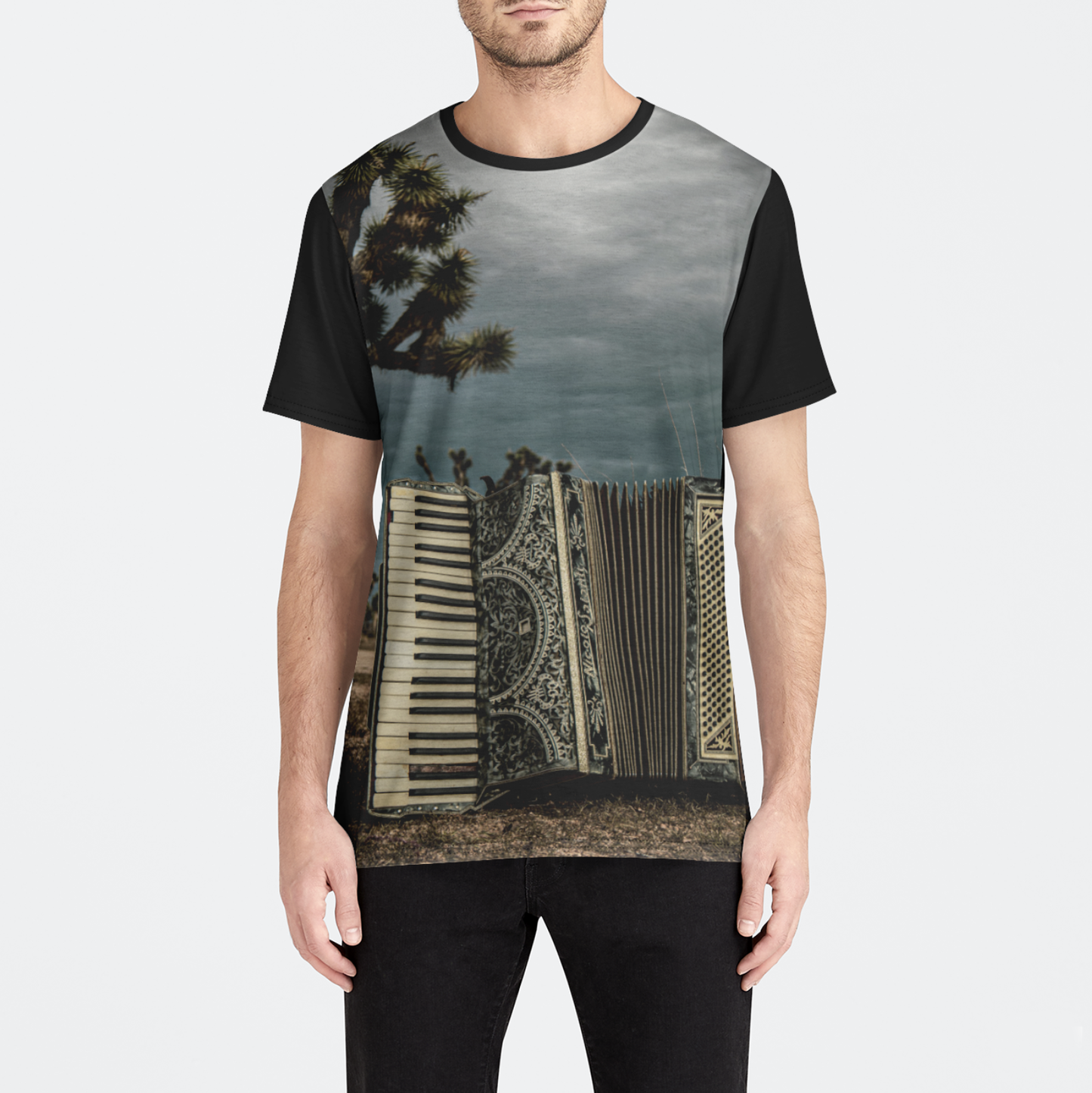 Person wearing a t-shirt with a unique design on a plain background