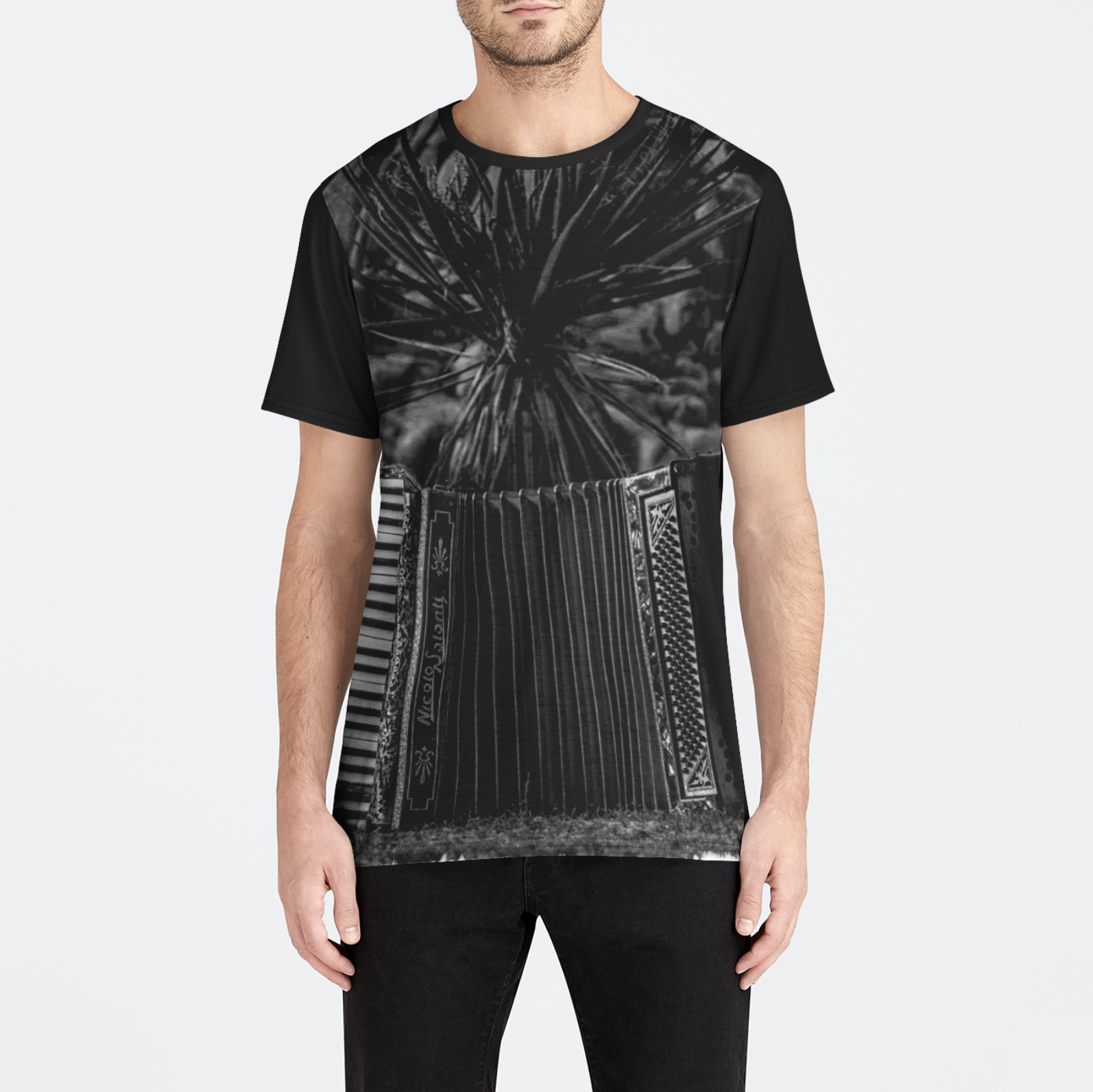 Person wearing a black t-shirt with a unique design on a white background