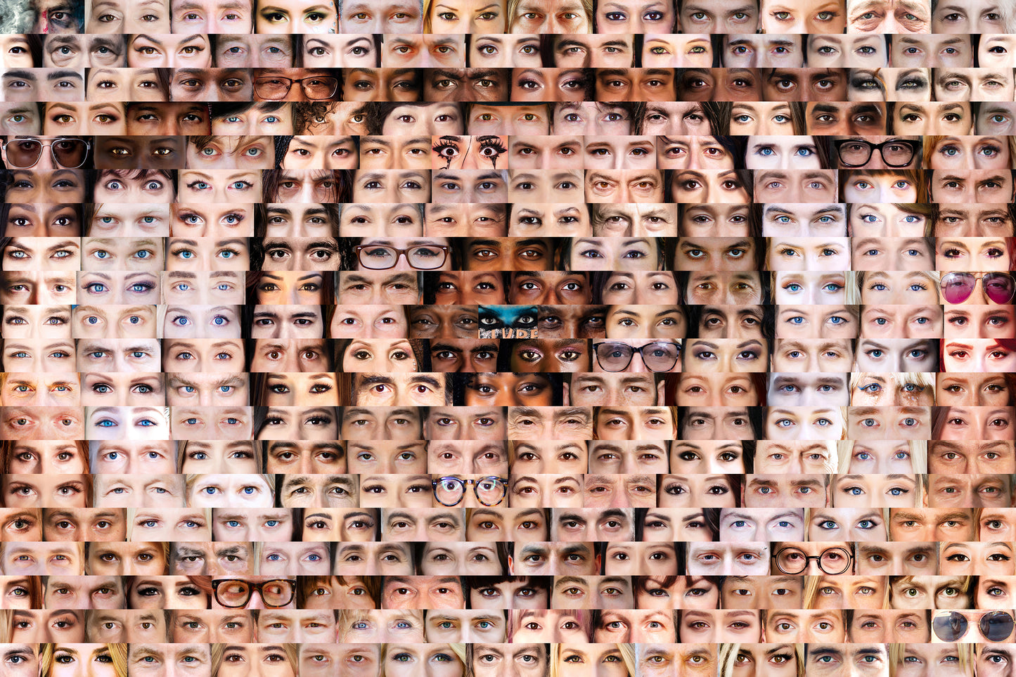 Pattern of various human eyes arranged in a grid.
