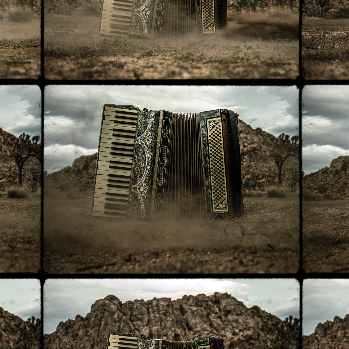 Decorative accordion in a desert landscape with mountains and clouds.