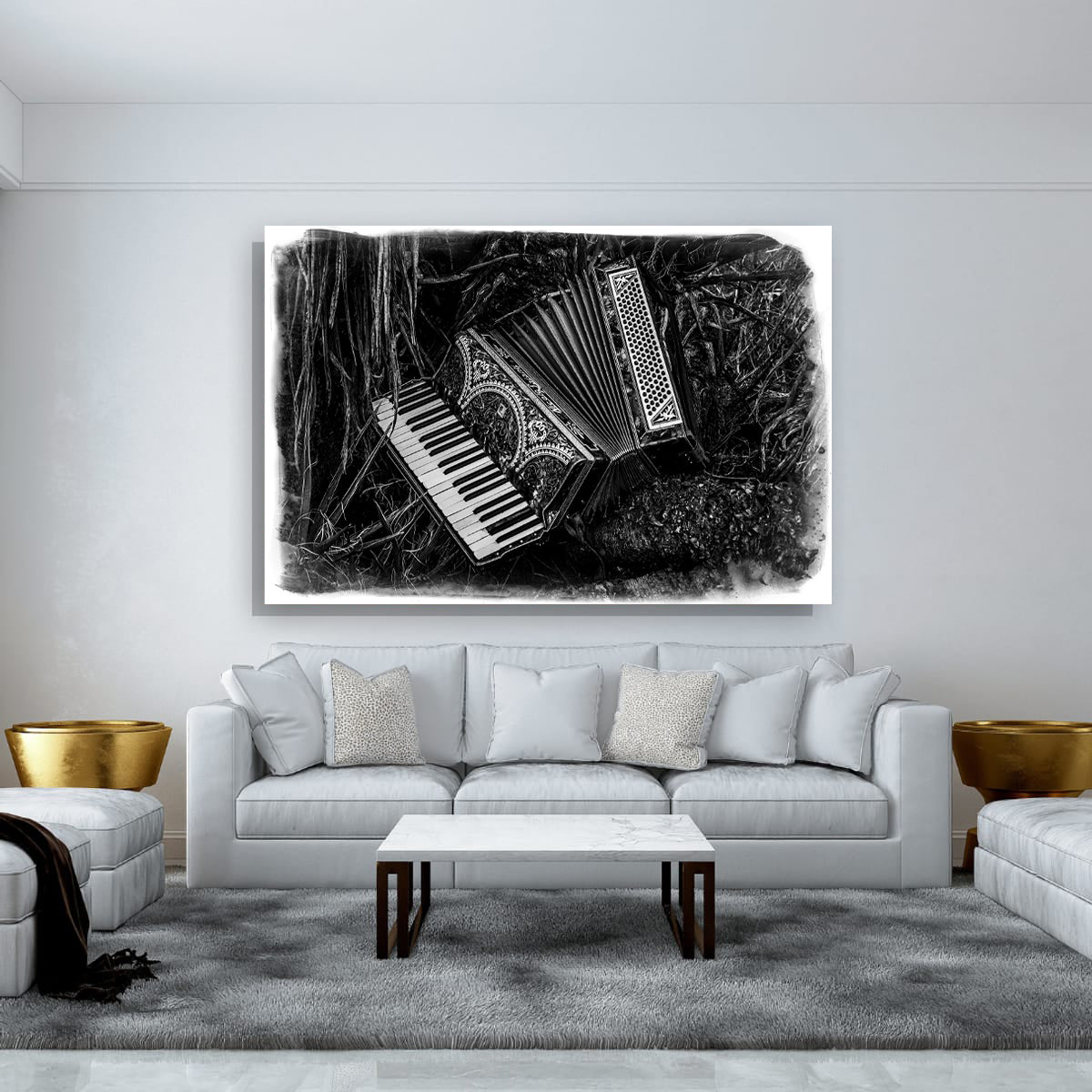 Framed artwork of a keyboard and accordion on a white wall above a sofa.