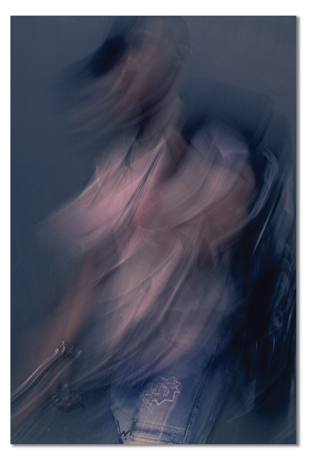 Abstract blurred image of a person with a dark background