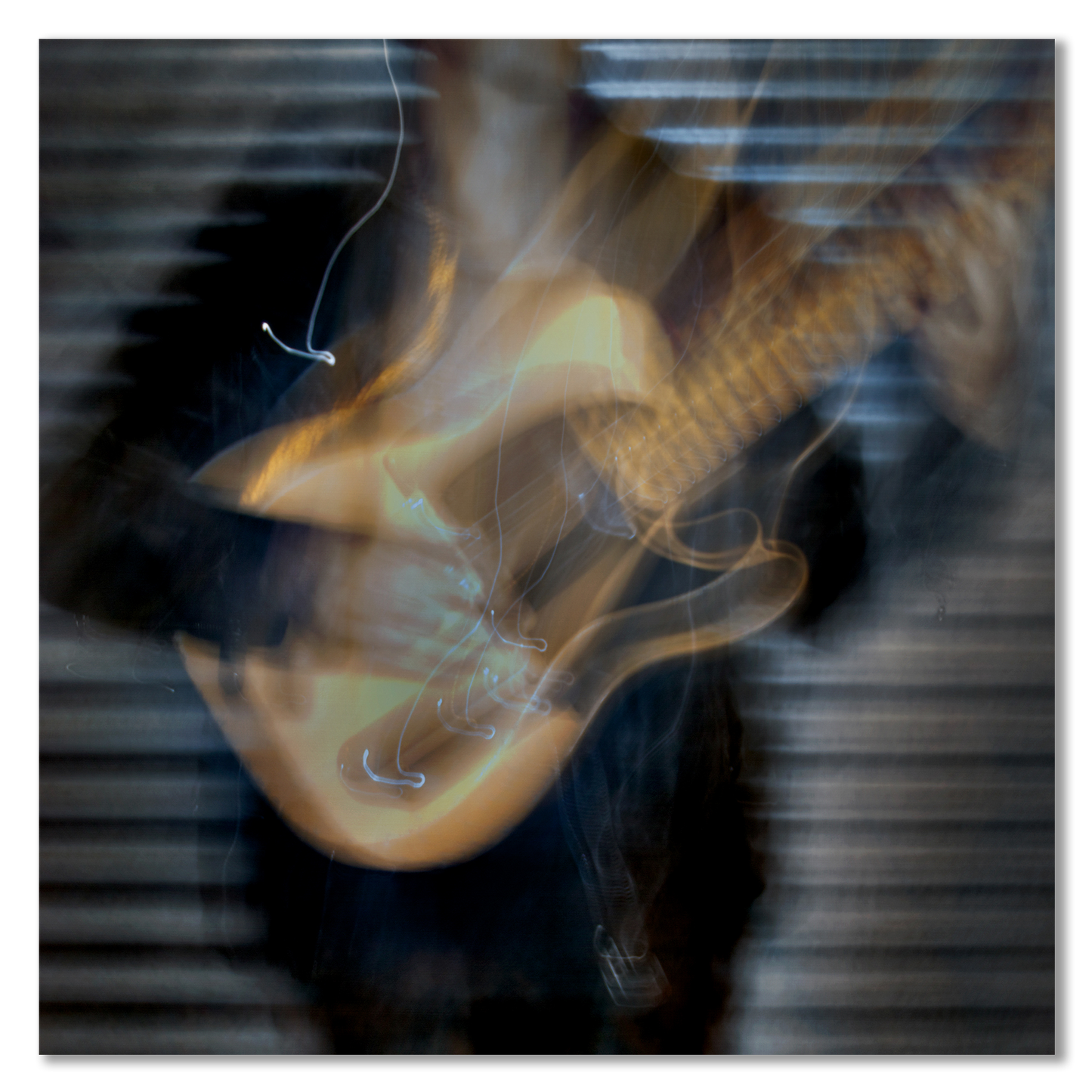 Abstract image of a guitar with blurred motion effect