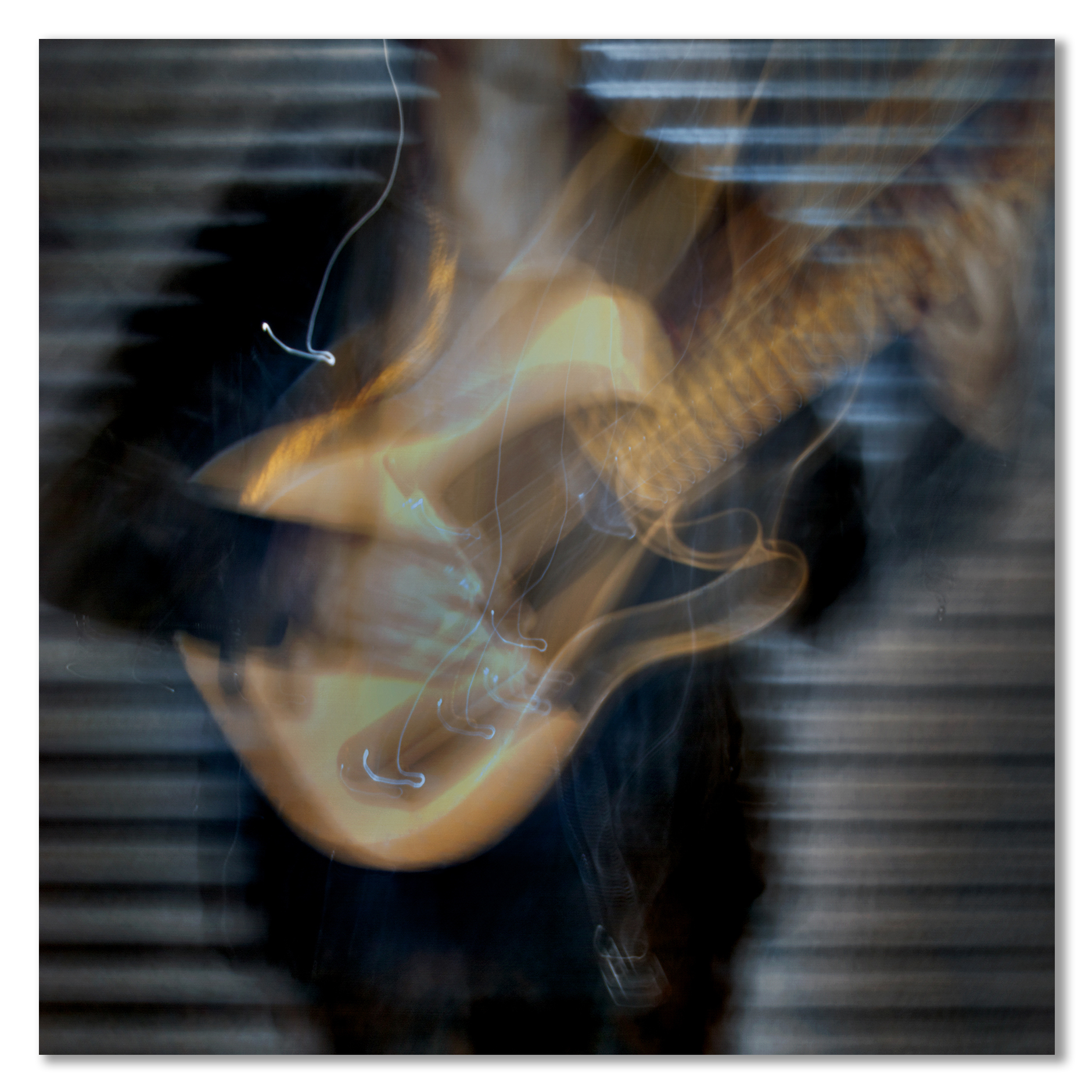 Abstract image of a guitar with blurred motion effect