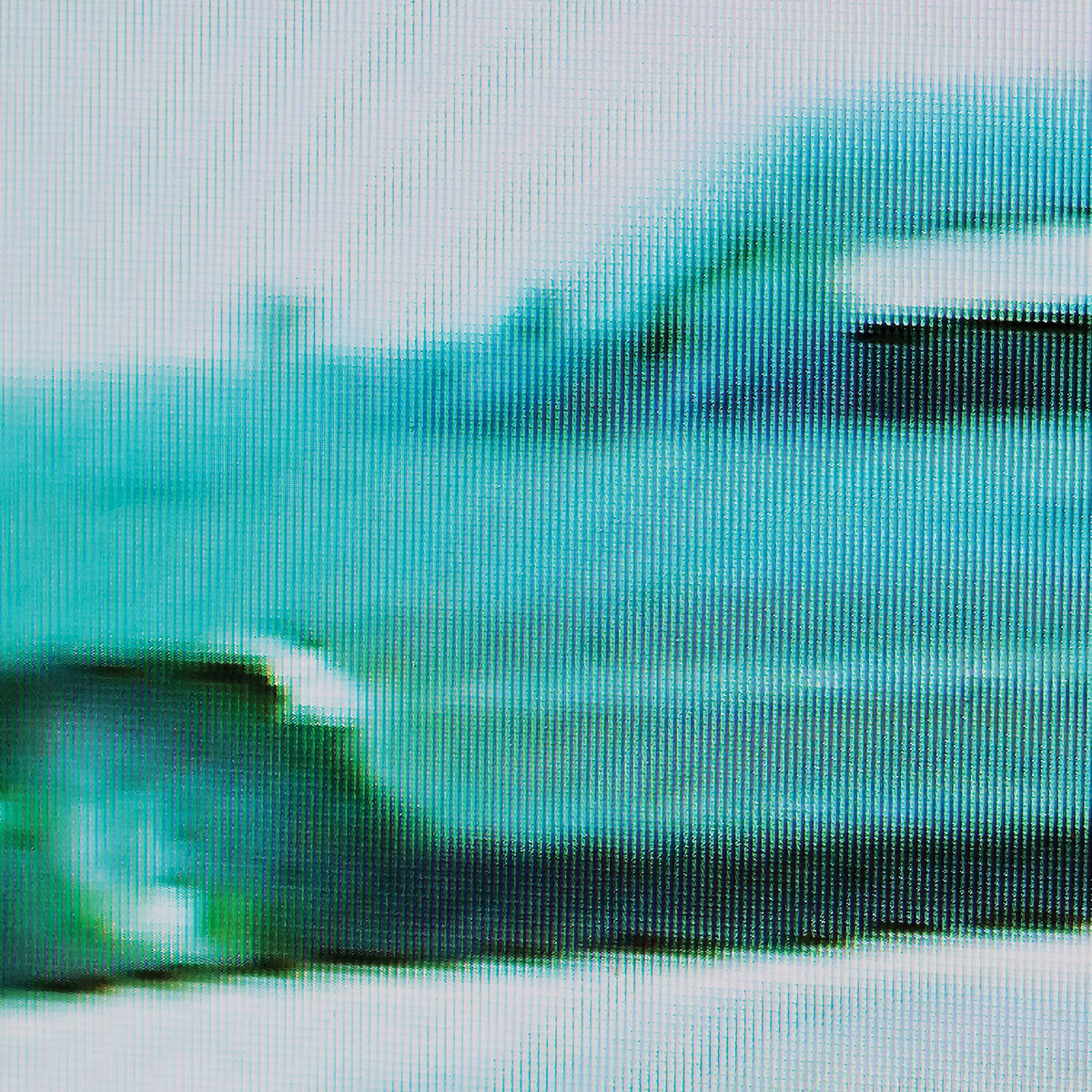 Blurred image of a green car on a road with a blurred background