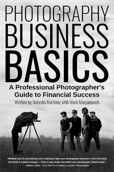 Photography Business Basics book paperback displayed standing up in black and white