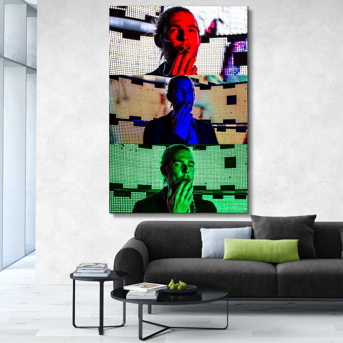 Colorful abstract art piece on a wall above a modern gray sofa in a living room.