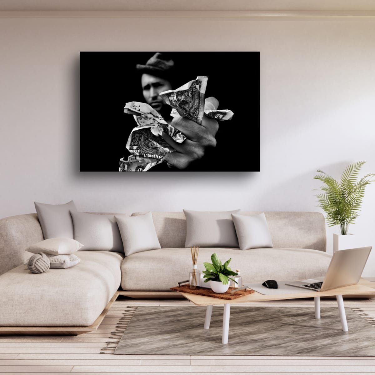 Modern living room with a painting of a man and money on the wall.