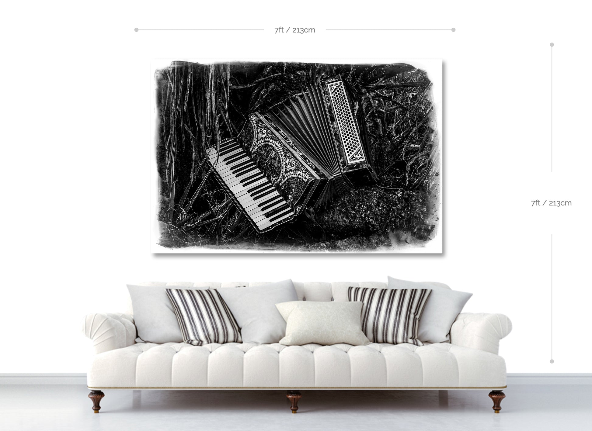 Decorative wall art of an accordion and piano keys on a white sofa with striped cushions.