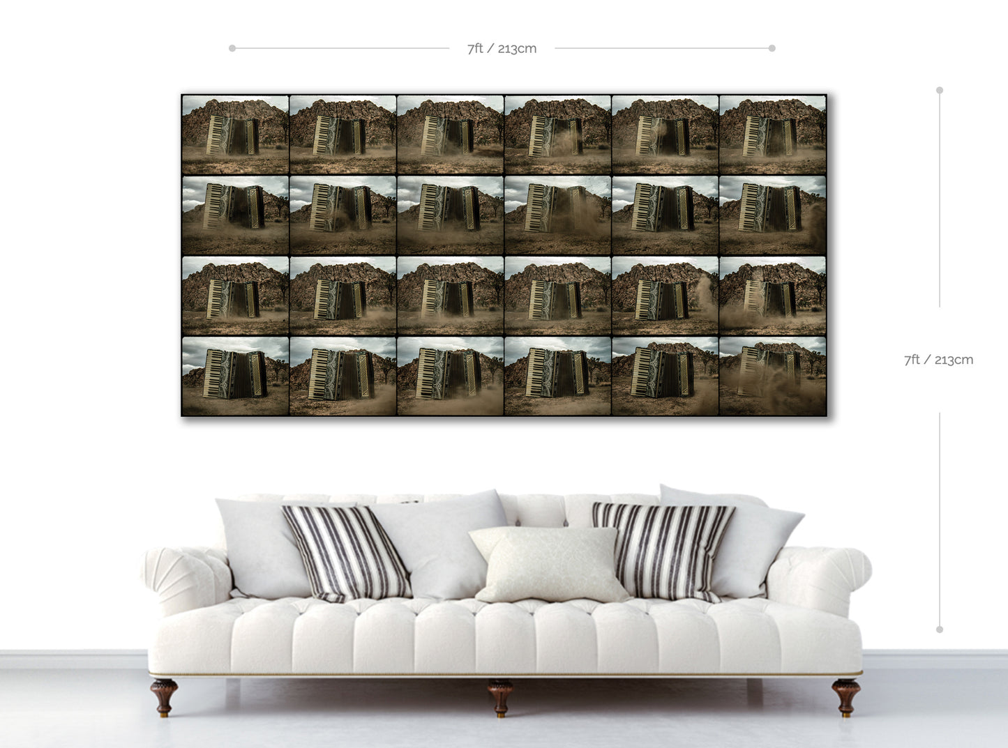White sofa with striped cushions in front of a large wall art displaying multiple images of a window.