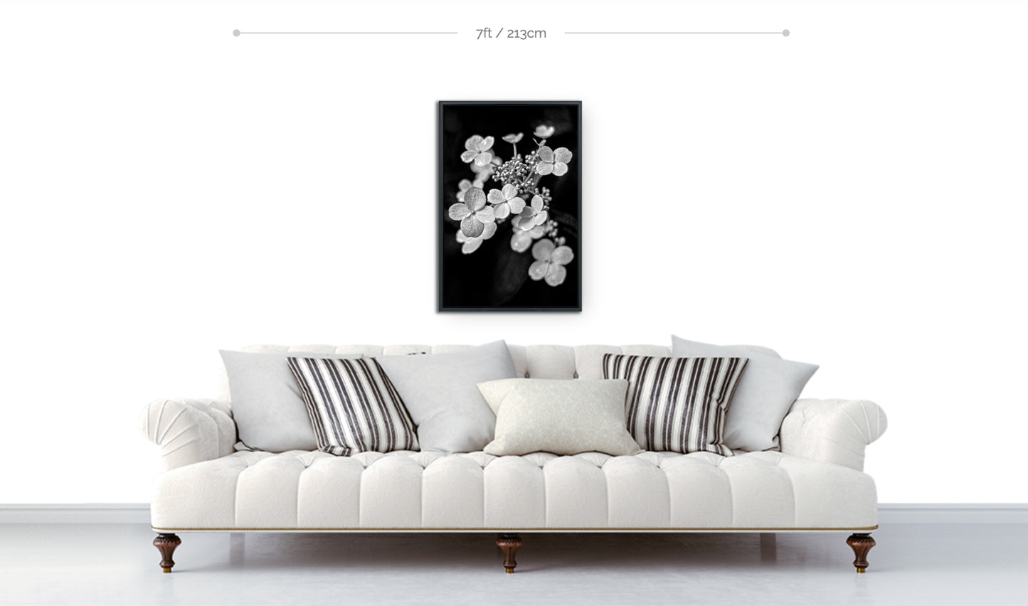 Flower wall art framed 30x20 metal print displayed hanging above sofa