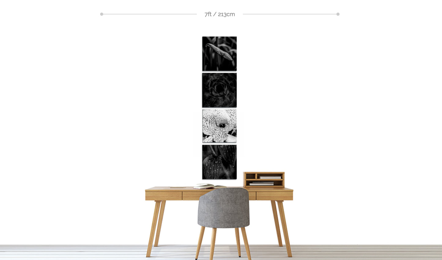 Set of 4 metal wall flower prints hanging in vertical line above desk in home office